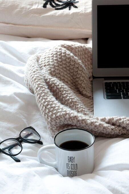 cosy laptop and coffee in bed